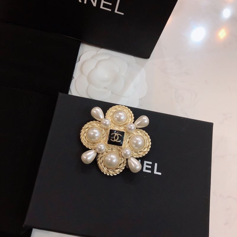 Ch*el brooches